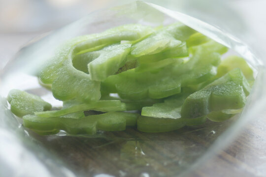 slices of green Bitter melon in a plastic bag