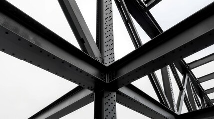 Naklejka premium Abstract View of Industrial Steel Structure with Geometric Shapes and Patterns Under a Cloudy Sky