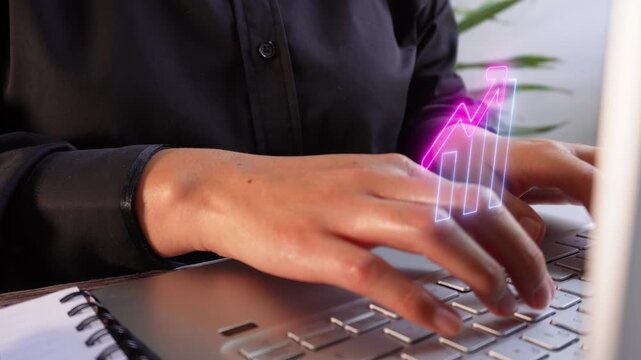 Increased financial performance. Close-up of female hands typing on a laptop with a virtual bar graph icon and an upward-pointing arrow.