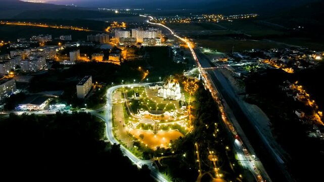 Gelendzhik, Russia. Cathedral of St. Andrew the First-Called. Andreevsky park. Night time. Drone footage, Departure of the camera