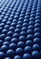 Obraz premium Rows of ripe blueberries create a rich blue textured background.