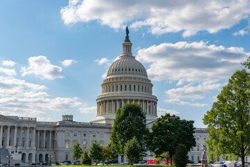 Fototapeta premium The Capitol building in Washington. Architecture view on dome with column. Famous Capitol in Washington DC. Washington DC landmark. Senate and House in Washington DC