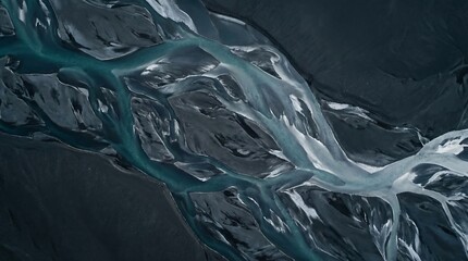 Obraz premium Aerial View of Glacial Braided River Channels in Black Sand