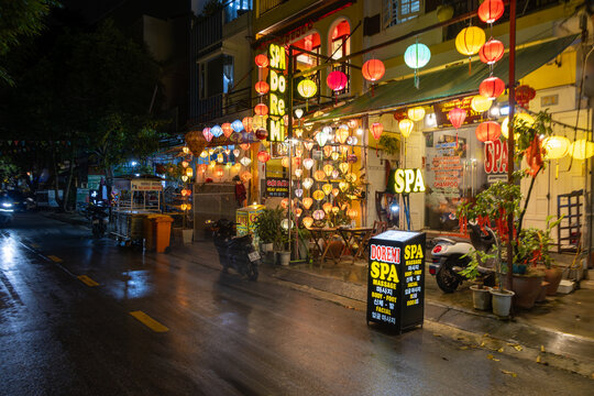 Hoi An, VIETNAM &ndash; 16 November 2025: A street view at night of the Doremi Spa, with colorful lanterns hanging outside the building in Hoi An, Vietnam.