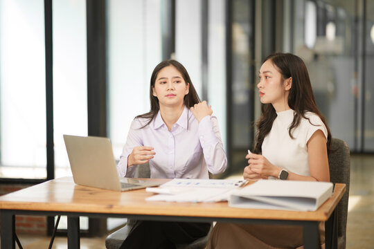 Business Team Analyzing Financial Charts and Data Reports