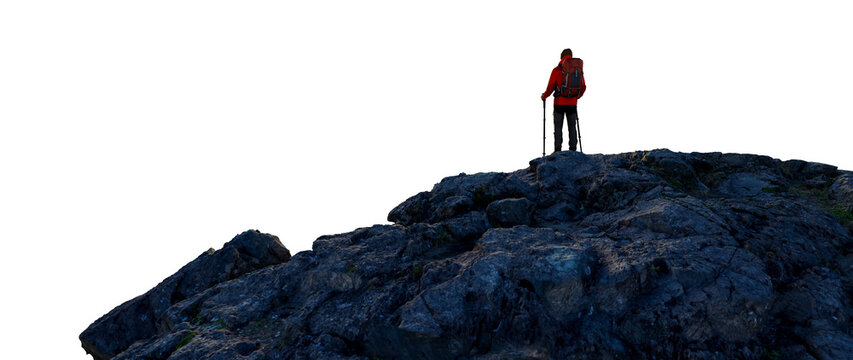 Hiker With Backpack Standing On Rocky Peak Looking Out Over Wilderness Horizon