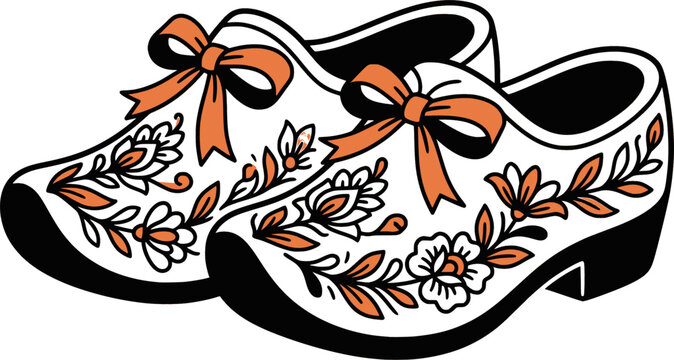 Dutch wooden clogs with orange ribbons and blooming flowers
