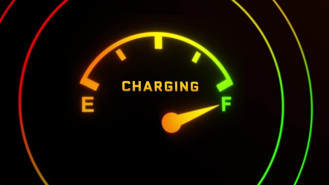 A close-up video of a car's electric fuel gauge showing a fully charged battery on a black dashboard