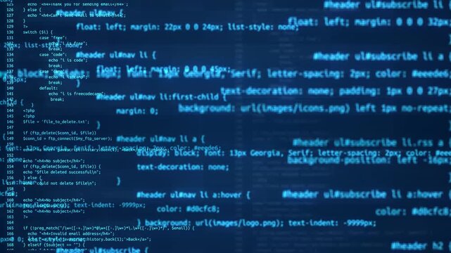 A video showcasing lines of code on a computer screen in a dark room with blue illumination