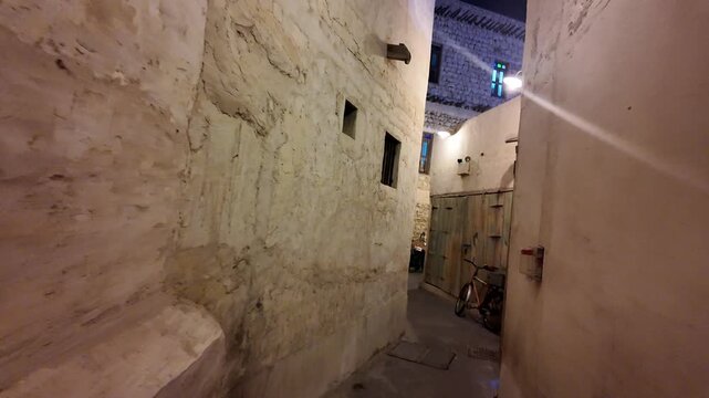 Exploring a narrow alley in an old stone town