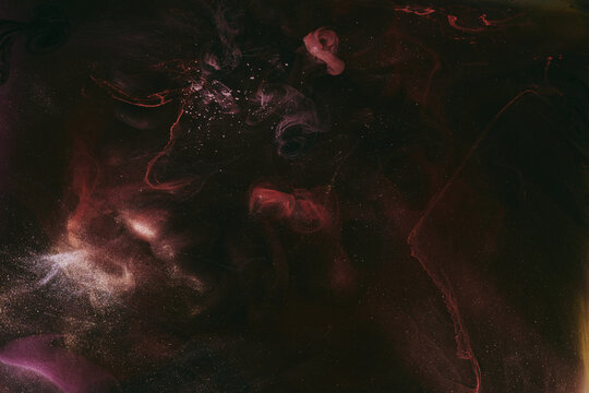 Luxurious abstract dark background. Explosive colors wallpaper, outer space pattern. Dynamic paint backdrop.