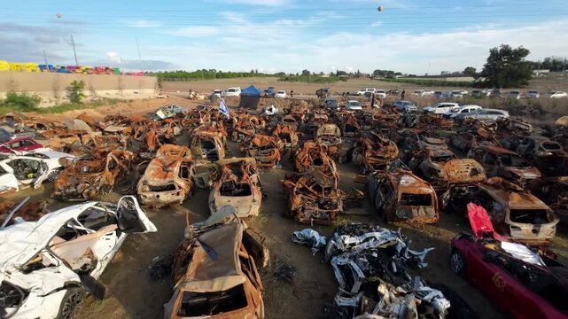 Aerial view burned cars Nova festival aftermath Israel, Netivot

Drone footage showing burned vehicles from Nova festival attack aftermath Israel March 24 2026 site
