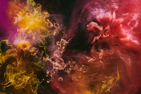 Abstract colorful red black background. Moving flow of paints, fluid liquid art, space sky
