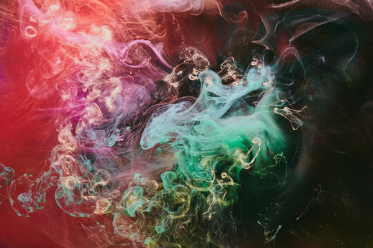 Abstract red green background. Moving smoke flow, fluid liquid art