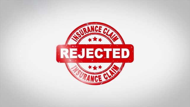 A rejected insurance claim video with a red stamp on a white background