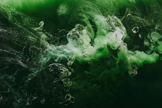 Abstract green background. Moving smoke flow, fluid liquid art.