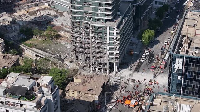 Aerial view Ramat Gan Iranian missile strike destruction Israel

Drone footage showing heavy structural damage from missile impact in Ramat Gan Israel June 13 2025
