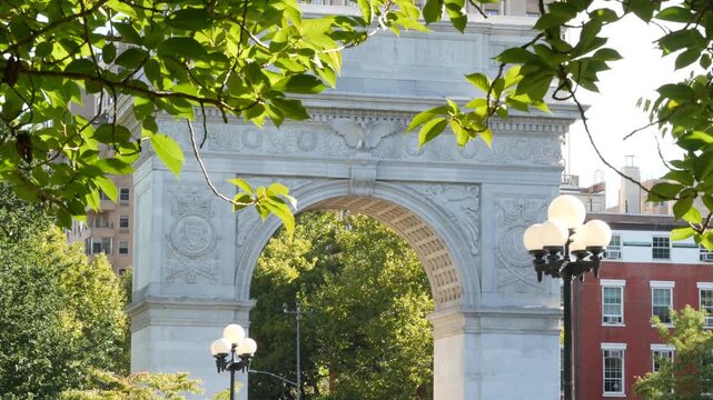 New York City Manhattan Washington Square Park arch, United States. Marble historic monument Greenwich Village. 5 fifth avenue triumphal arch. Autumn fall garden greenery. George Washington memorial.