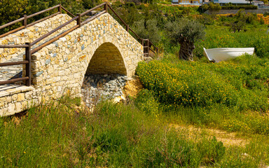 Obraz premium Bridge in Old stone monastery of Saint Georgios the Spilaion near city Limassol, Cyprus