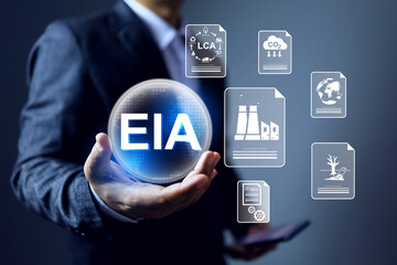 Environment impact assessment EIA concept businessman holding globe ball with hazard icon that could be effect to surrounding project such as waste water, air pollution, chemical toxic