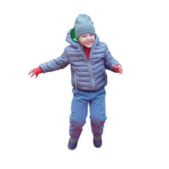 Fototapeta premium Happy little boy jumping in winter clothing isolated on transparent background. Energetic preschooler child wearing grey jacket and beanie hat. Active childhood, outdoor play and winter fashion.