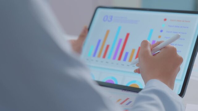 Close up. financial advisor or crypto trader holding digital tablet in hands consulting stock market investor analyzing trade charts dynamic indexes investing trends on tab screen. Business analyst