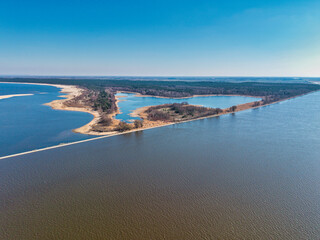 Beautiful scenery of the Vistula River mouth into the Baltic Sea in spring, Poland