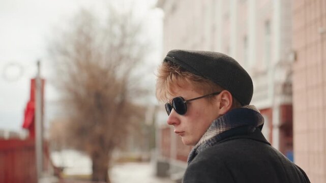 Walking caucasian creator through city street, backview to turn and face camera, sunglasses lift moment, scarf flutter, confident vibe roles alternate between model, influencer, investigator, street