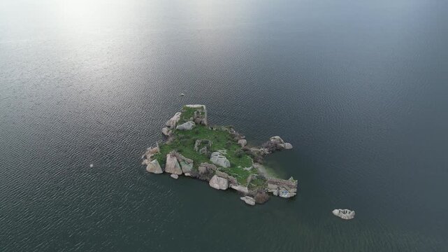 Panoramic View of Ancient Monastery Ruins on Bafa Lake Island at Dawn. High quality 4k footage