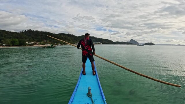 Evening return from island tour with local steering boat across calm water