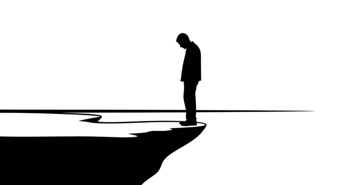 Silhouette of a sad man standing.