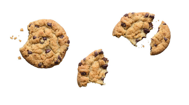 Broken chocolate chip cookies and crumbs, some bitten, isolated on a transparent background for indulgent snack designs.
