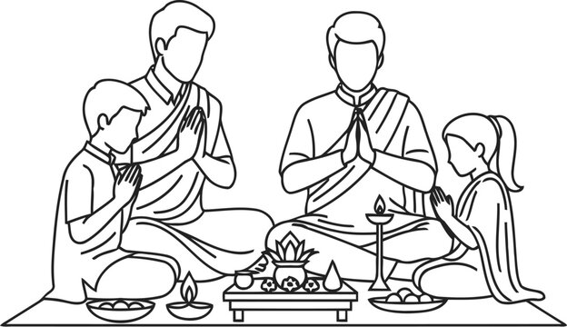 A family of four praying together during a traditional indian festival celebration at their home