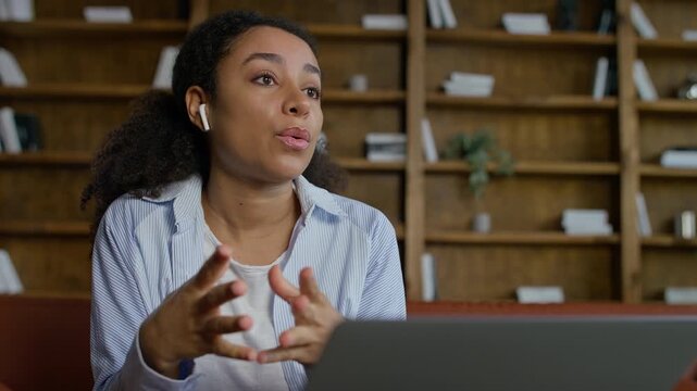 Student speaking during video call at home