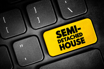 Fototapeta premium Semi-detached House is a single family duplex dwelling house that shares one common wall with the next house, text button on keyboard, concept background