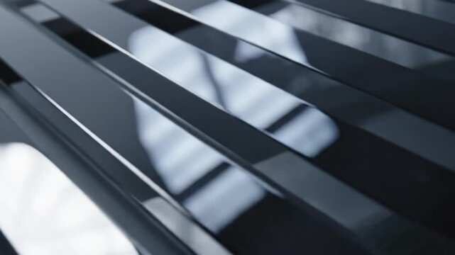 Abstract dark glossy metal slats with soft white reflections