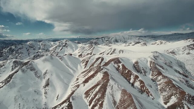 Drone Shot Of Altai Mountain Snowy Landscape In Mongolia