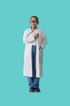 Smiling young woman in a doctor's uniform stands, using a stethoscope to listen to a doctor's heartbeat, conveying hope, ambition, and dreams of a future in the medical field