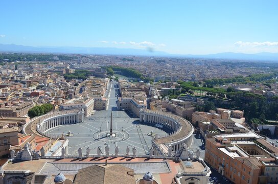 Famous Saint Peter's Square in Vatican and aerial view of the city