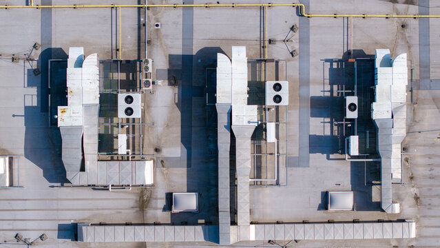 Aerial view of a large data center roof featuring advanced hvac units and comprehensive ventilation infrastructure for servers, Warsaw, Masovian Voivodeship, Poland.