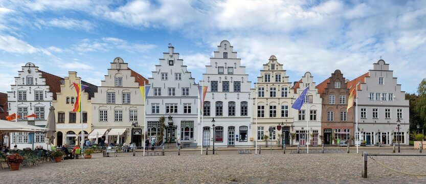 The Amsterdam or Dutch houses at a square at Town of Friedrichstadt, located in Schleswig-Holstein, Germany, is a charming town known for its unique history and notable architecture.