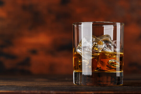 Glass of whiskey with ice