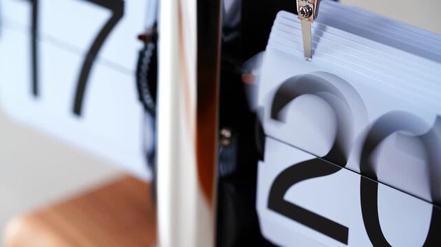 Desktop flip clock that is running.