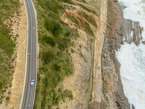 Aerial view of the rugged coastline where the road meets the dramatic cliffs, Buarcos-Figueira da Foz, Figueira da foz, Portugal.