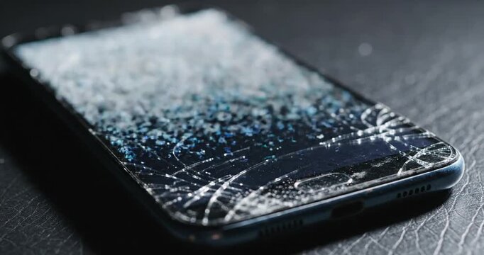 Cracked Smartphone Screen Closeup.