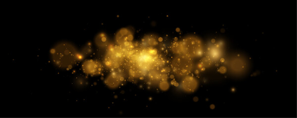 Golden sparkles drift in soft motion blur light. Tiny glowing particles create festive luxury celebration feel. Holiday composition. © Extrastock