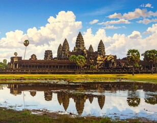 Fototapeta premium Ancient temple complex with towers and reflection in water