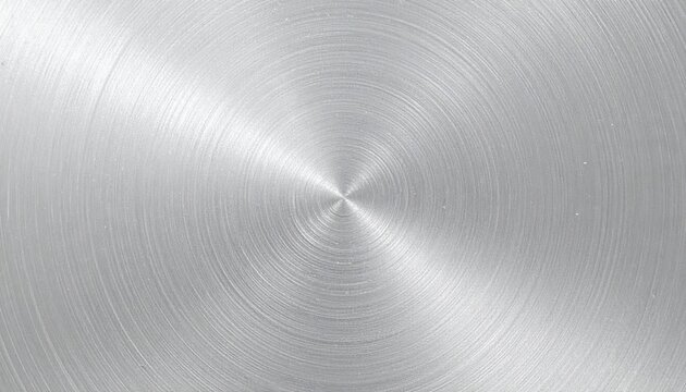 Textura met&aacute;lica prateada com acabamento escovado circular, reflexo de luz brilhante no centro.