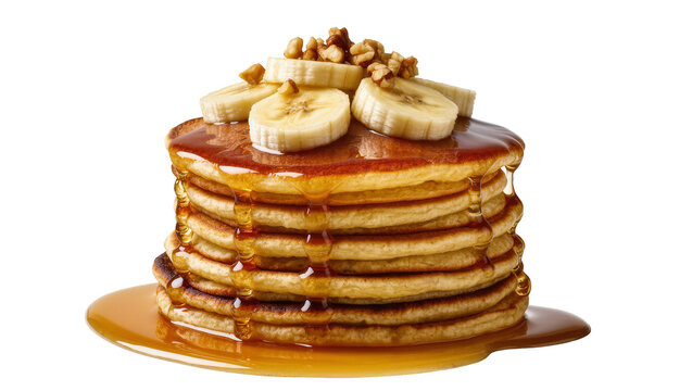 Isolated stack of golden pancakes with maple syrup, sliced bananas, and chopped walnuts