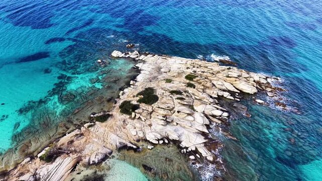 Aerial view of Karydi Beach in Vourvourou, Sithonia peninsula, Chalkidiki, Greece in spring offseason